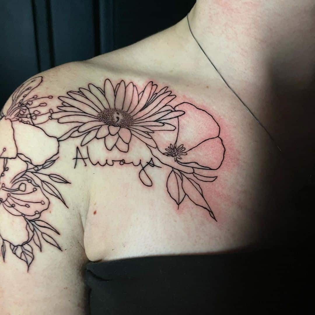 Ideas del tatuaje de la flor del aster sobre el pecho 