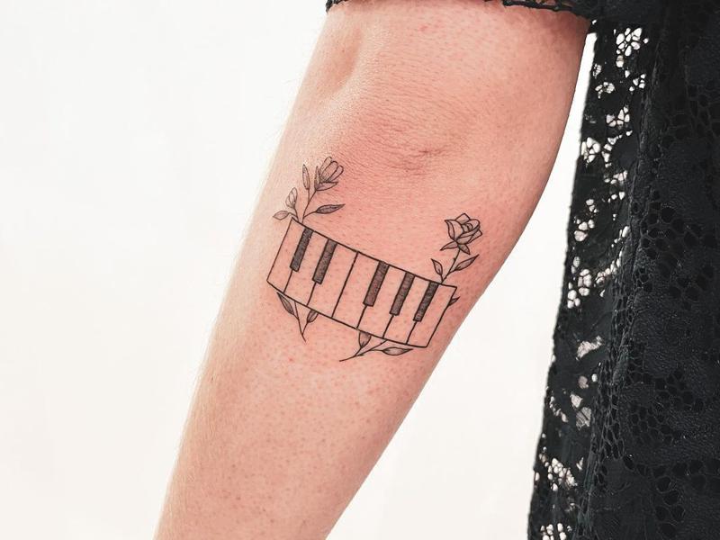 Diseño de tatuaje de piano 5