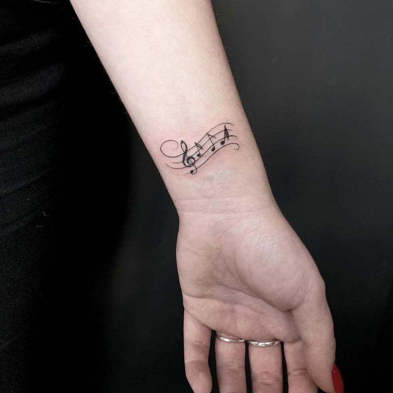 Diseño de tatuaje de notas 3