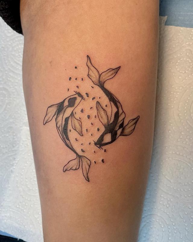 Tatuaje de pez koi que muestra coraje y valentía 3