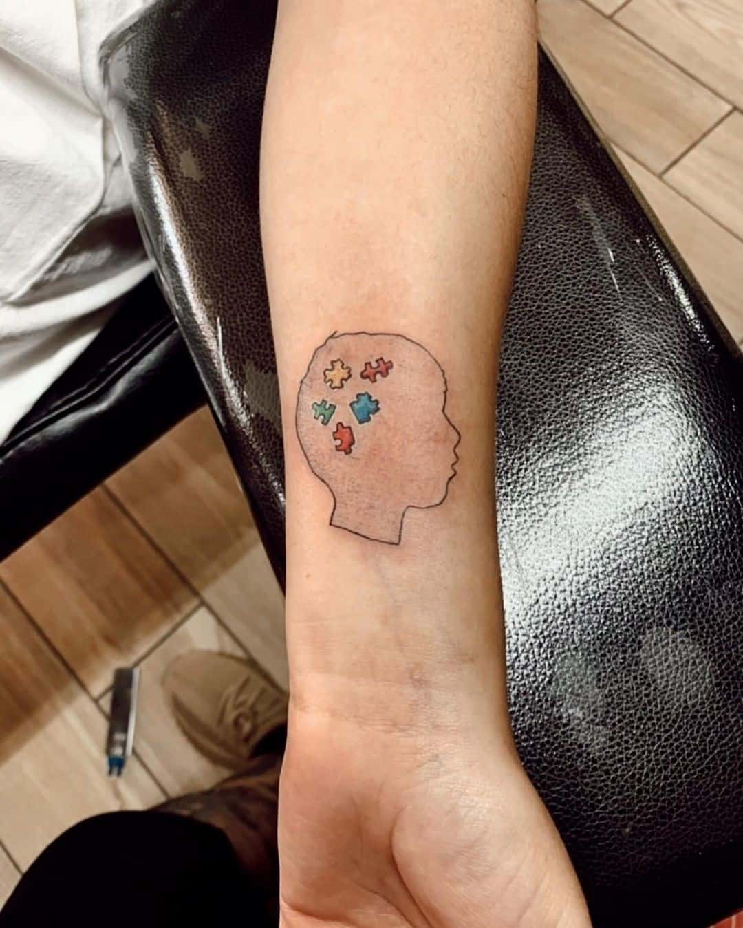 Pieza del rompecabezas del tatuaje del autismo 