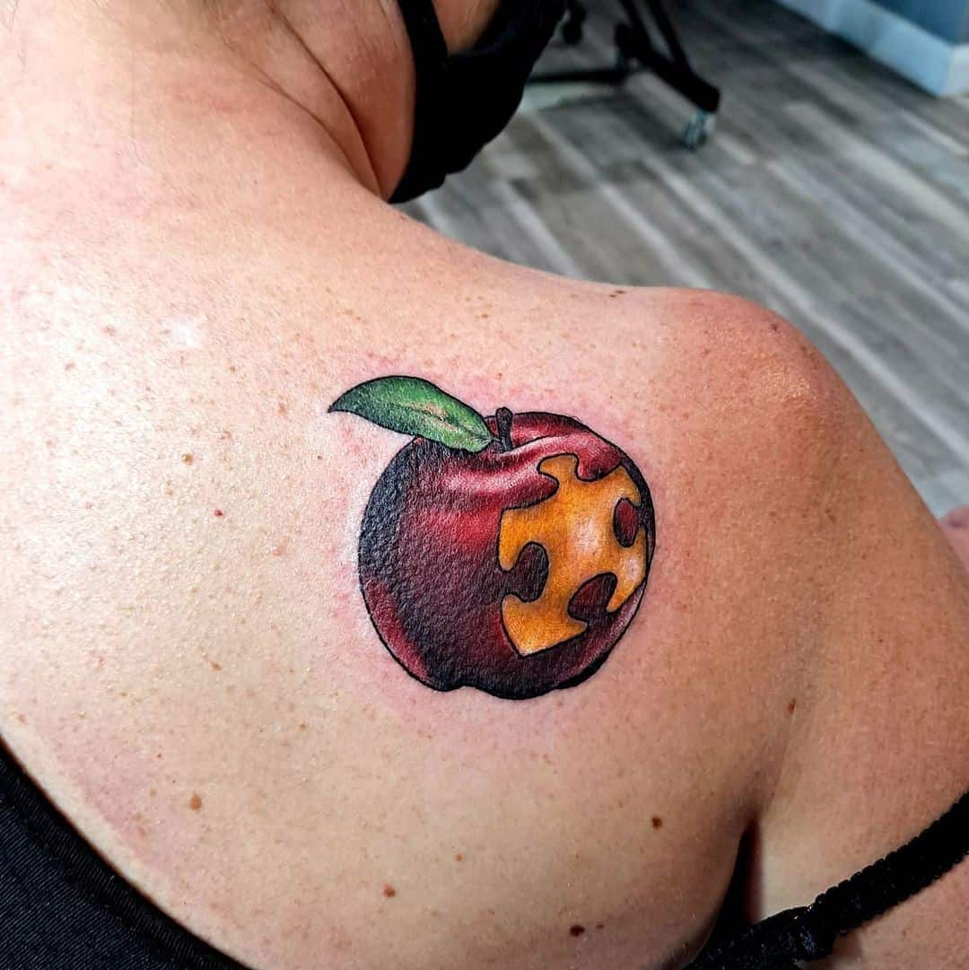 Concienciación sobre el autismo Tatuaje Apple Idea