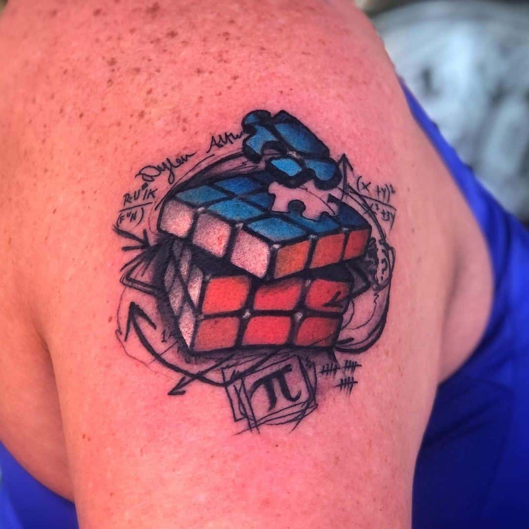 Idea del tatuaje del autismo del cubo de Rubik 