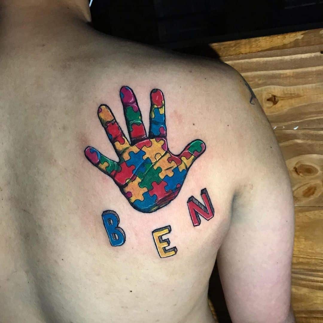 Tatuaje de autismo con estampado de palma 