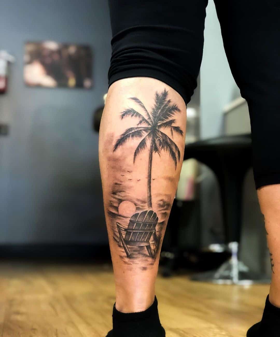 Tatuaje de palmera con puesta de sol 1