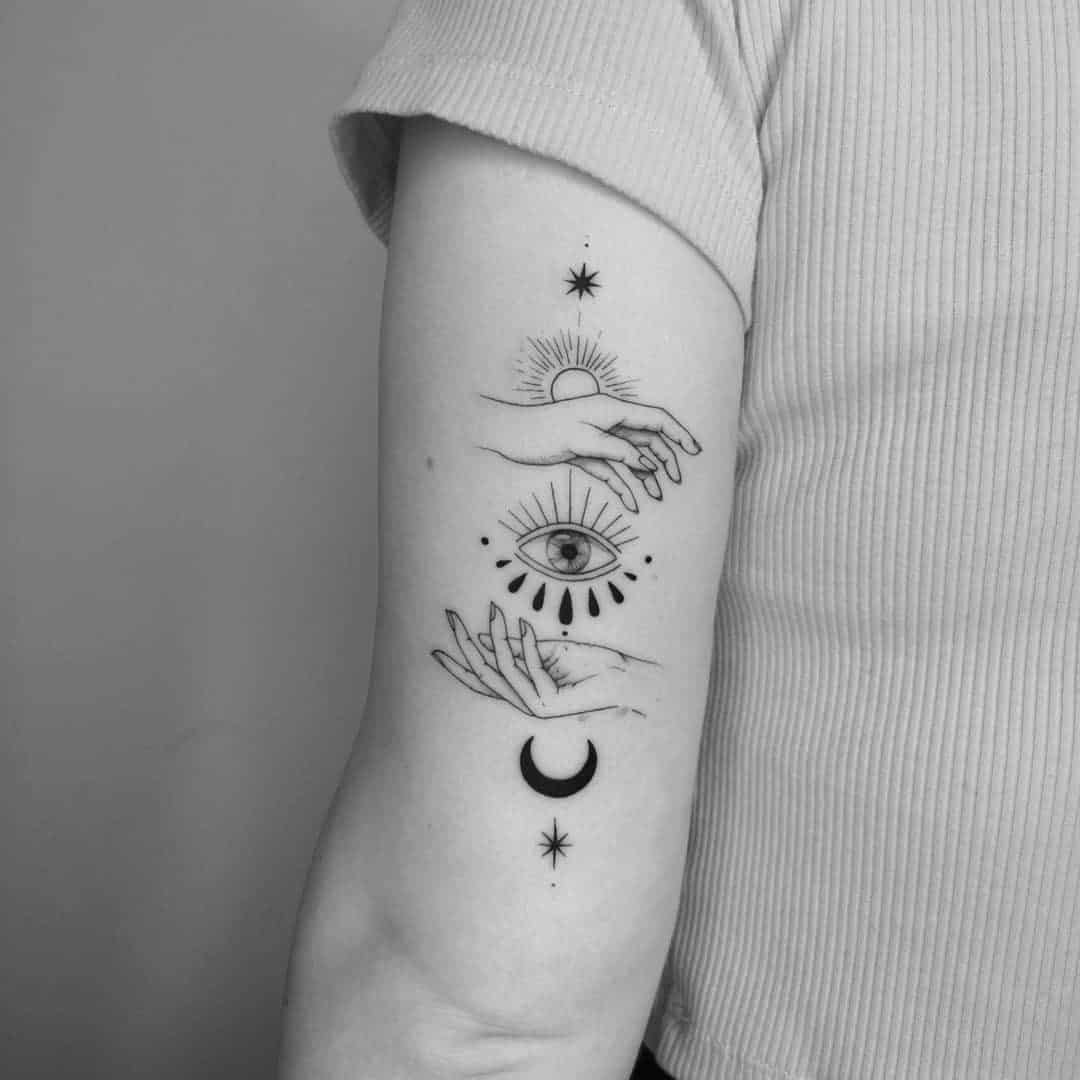 Tatuaje en el brazo, mal de ojo negro 