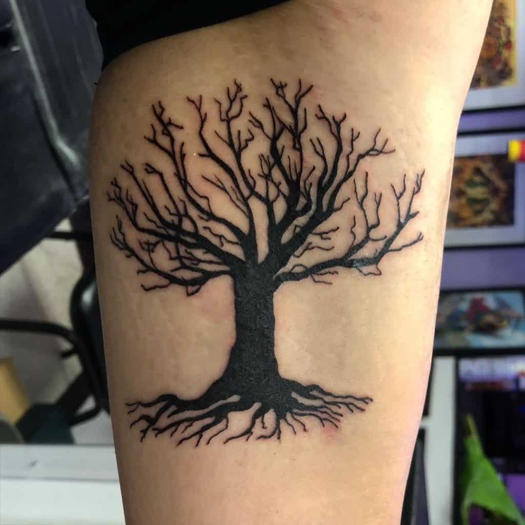 tatuaje de arbol de la vida sobre cicatriz