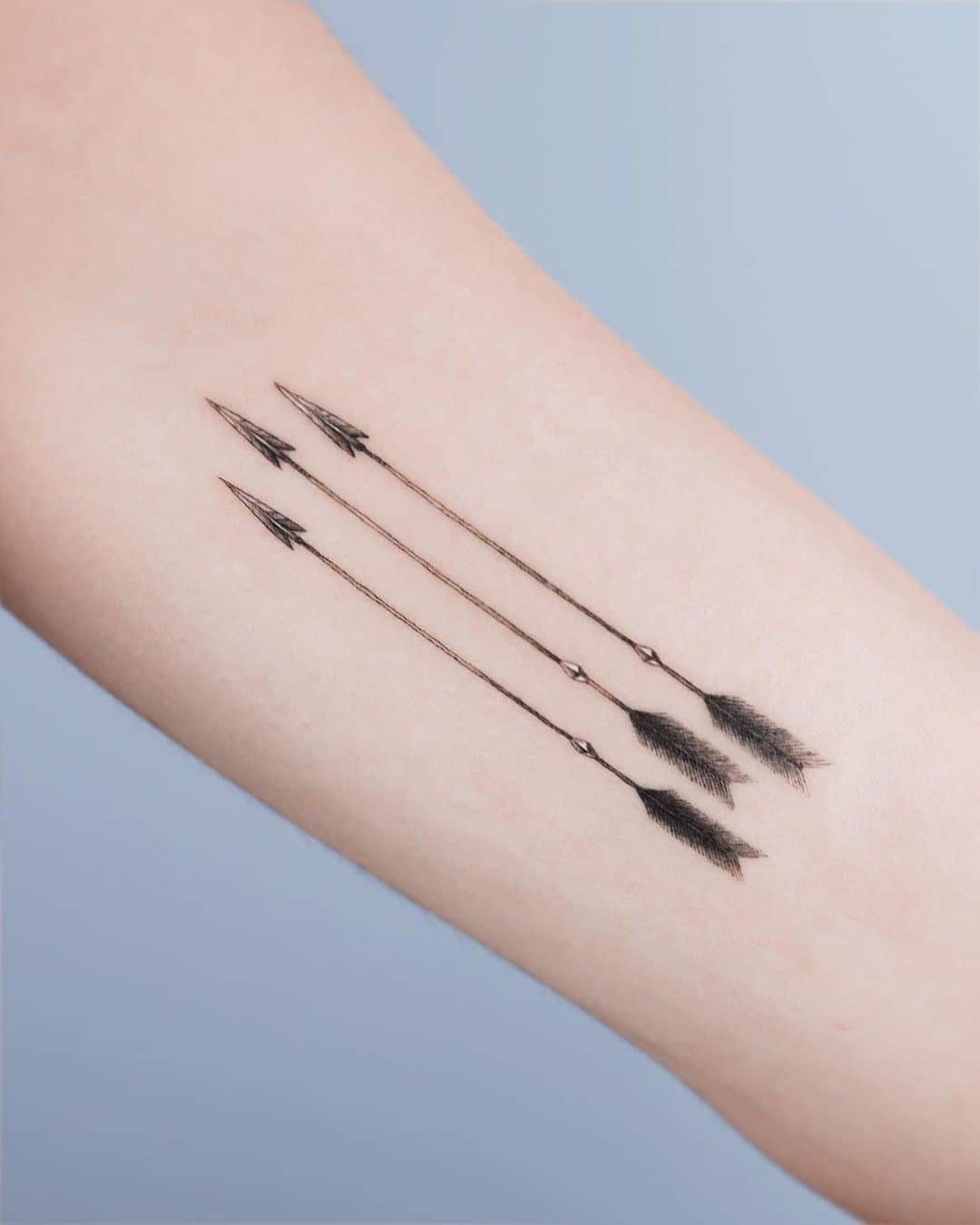 3 diseños de tatuajes de flechas