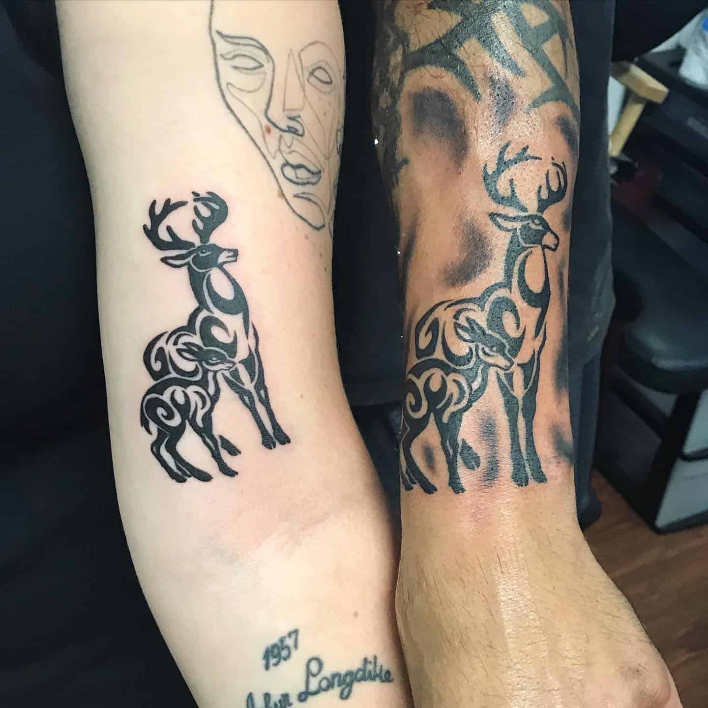 Tatuajes tribales de padre e hija 1