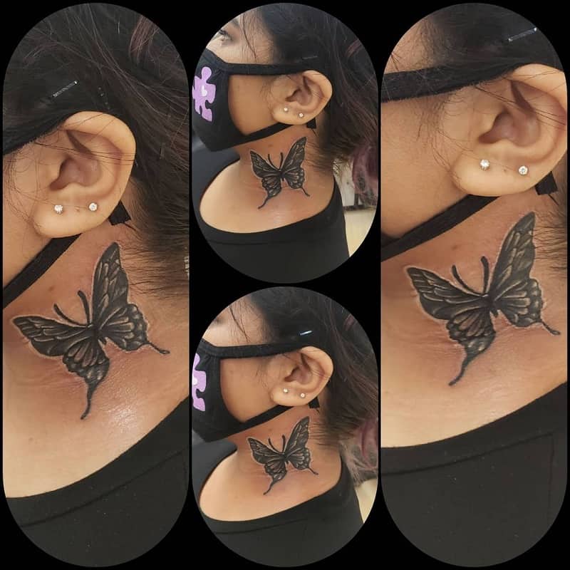 tatuaje de mariposa en el cuello de las mujeres