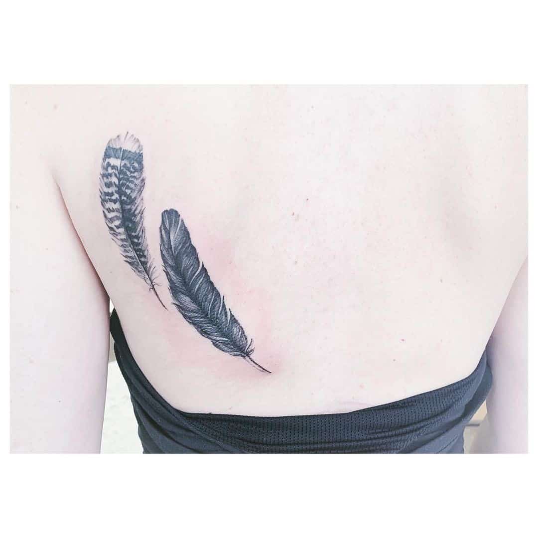 Tatuaje de pluma de pavo 3