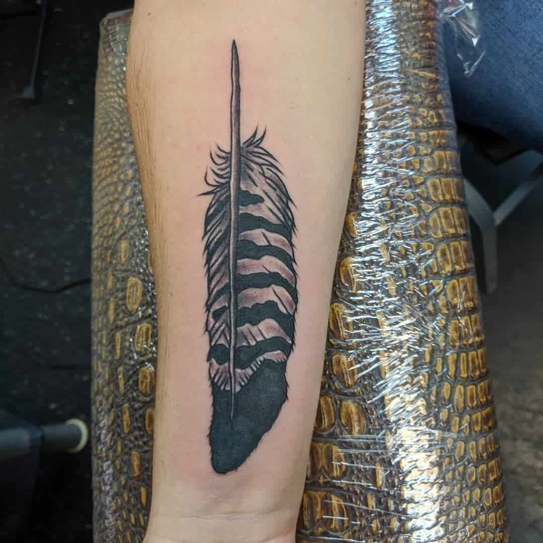 tatuaje de pluma de buho 2