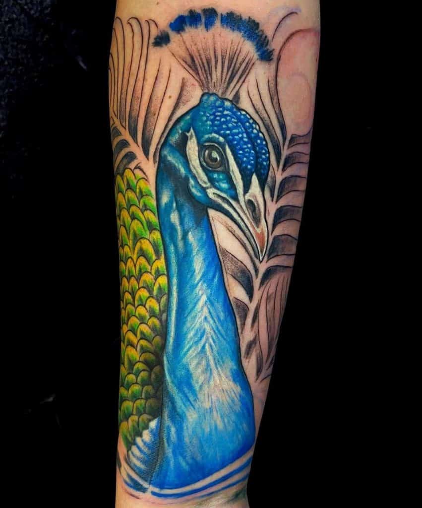 Ideas de tatuajes de pavo real azul brillante