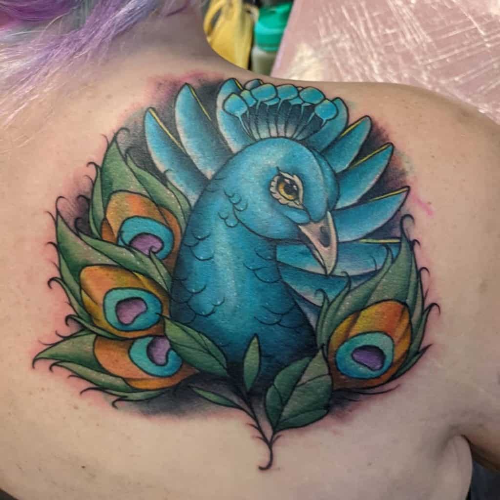 Tatuaje en la espalda, pavo real azul