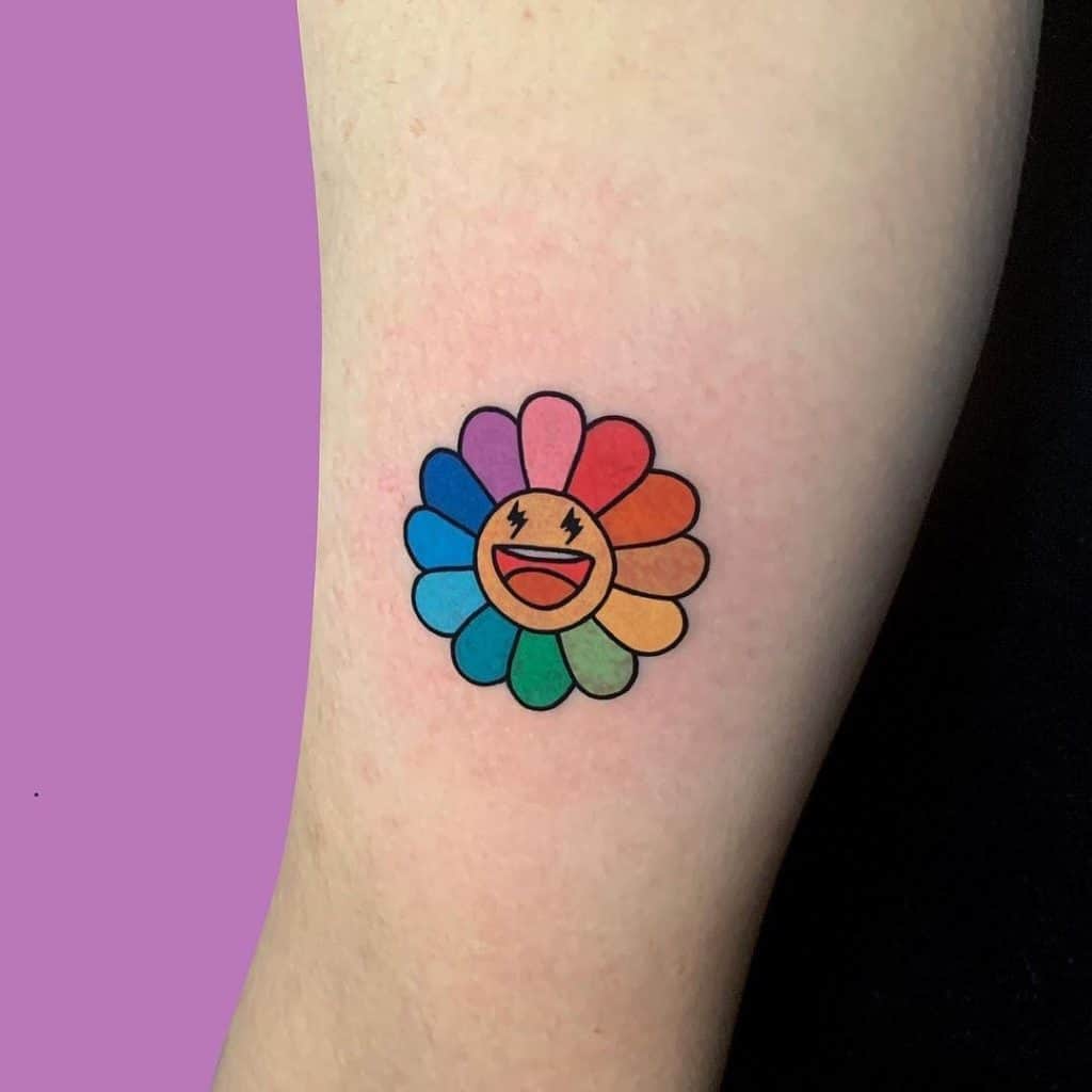 Idea de la flor del tatuaje del arco iris