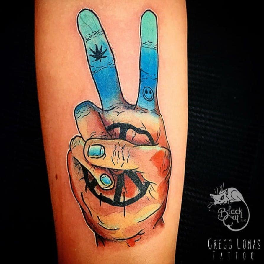 Idea de tatuaje de símbolo de paz azul brillante y colorido