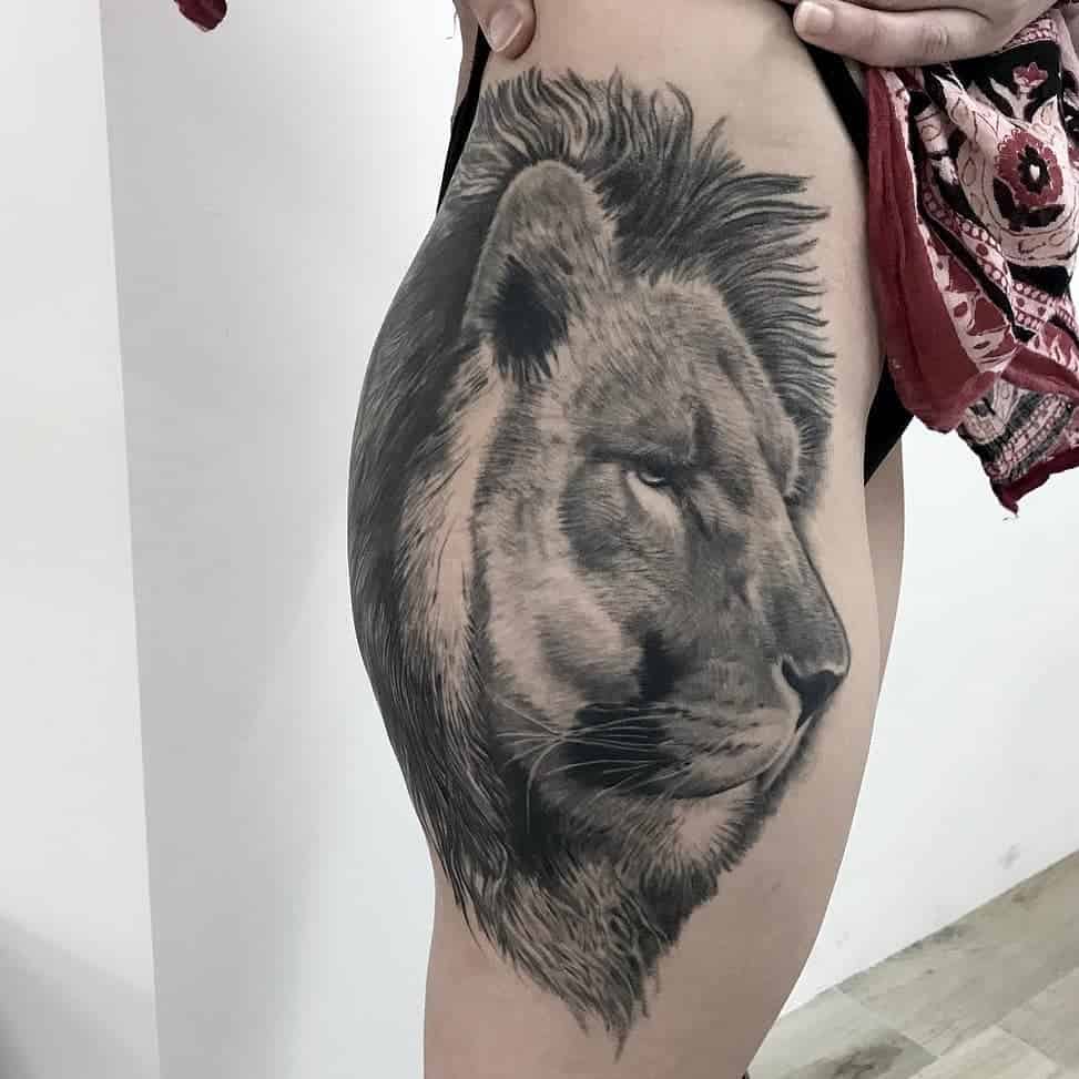 Tatuaje de pierna de cabeza de león