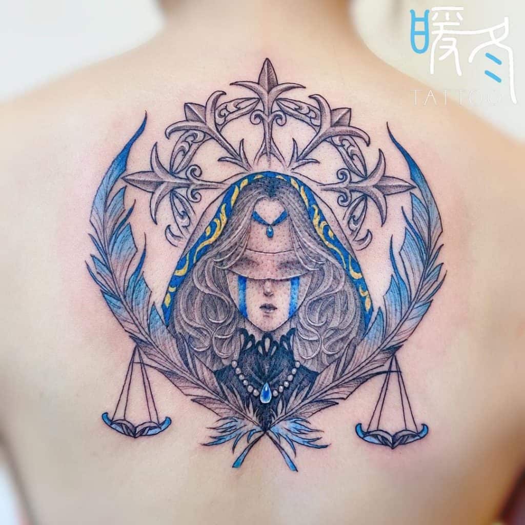 Tatuaje en la espalda de Libra 1