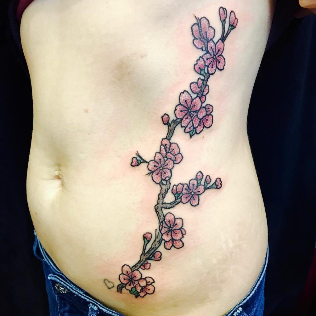 1657464007 389 75 asombrosos tatuajes de flores de cerezo y su significado