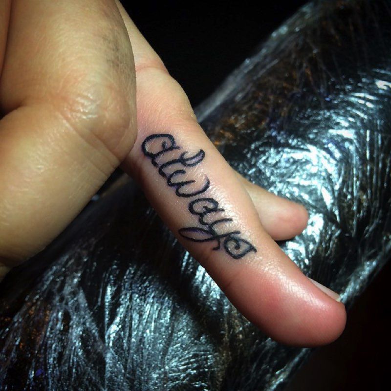 Side Of Finger Tattoo